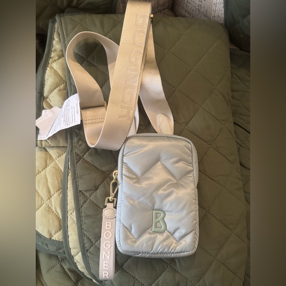 Bogner Mini Phone Pouch Crossbody Bag with Cream Strap in a Mint Color.